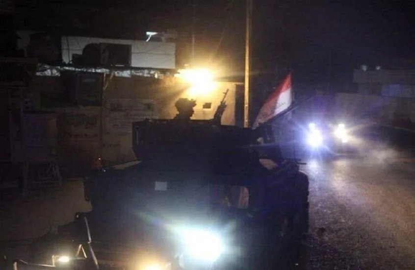 صورة مميزة: مراسل وصول تعزيزات كبيرة للقوات الأمنية إلى منطقة الشعب ببغداد إثر اندلاع اشتباكات مسلحة ()